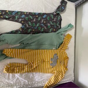 Simple Joy 6-9 months footed pajamas set of three